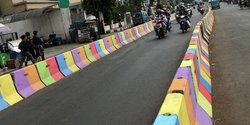 Cat Jalan Warna Warni. Polisi pertanyakan maksud Pemprov DKI cat warna warni separator