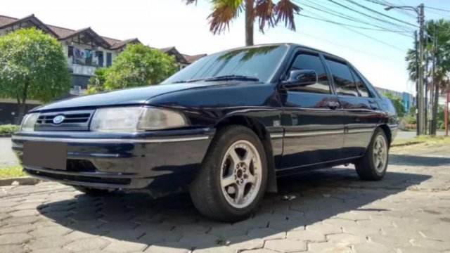 Kelebihan Dan Kekurangan Ford Laser 97. Review Ford Laser Champ 1991: Tertantang Untuk Merawat Mobil